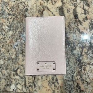 NWOT Pretty light pink card and passport holder. Kate spade.
